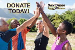 Donate today (2) Happy fitness multiethnic class giving high five after completing exercise session. Group of sweaty mature men and sporty women giving high five and looking up. Smiling friends celebrate their success.